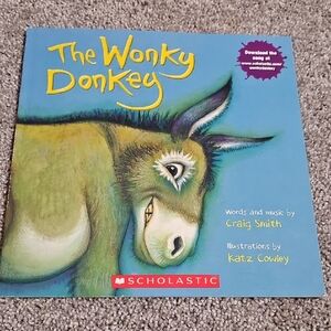 🟠E6🔹️Scholastic's The Wonky Donkey - Blue and Yellow Cover